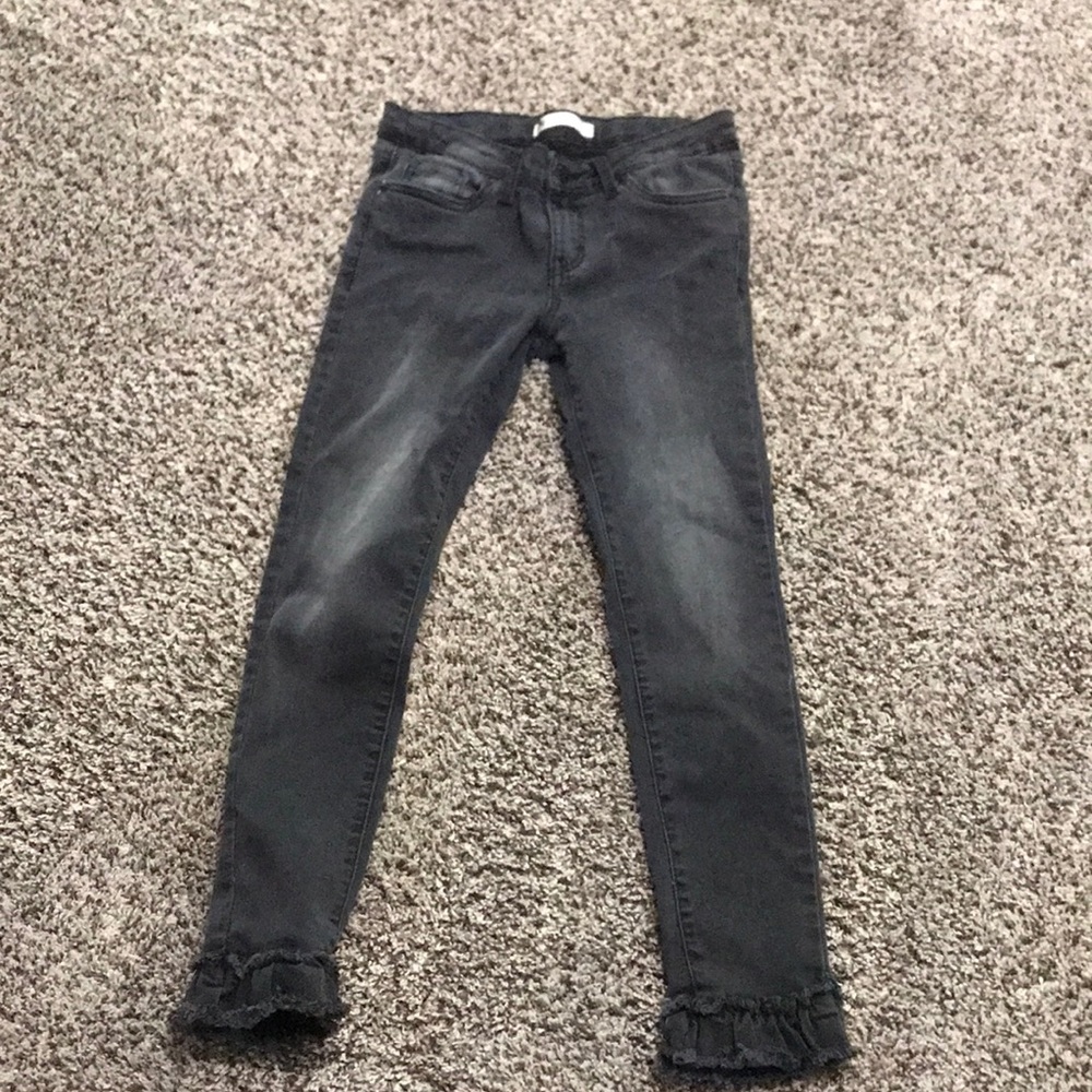Levi’s: Black Jeans with Ruffles on the end